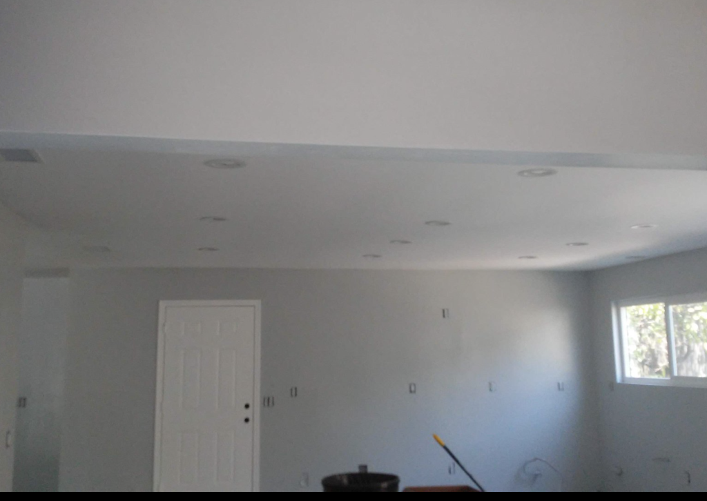 New drywall hung and finished, ready for paint, in St. Petersburg, FL